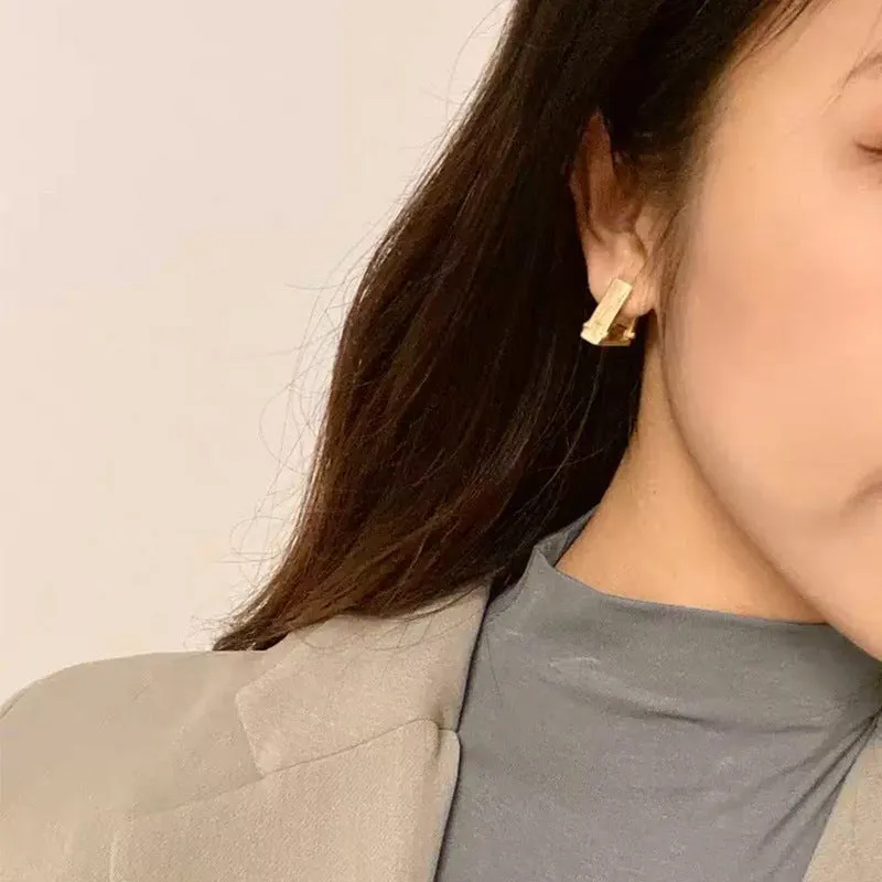 CELINE letter earrings